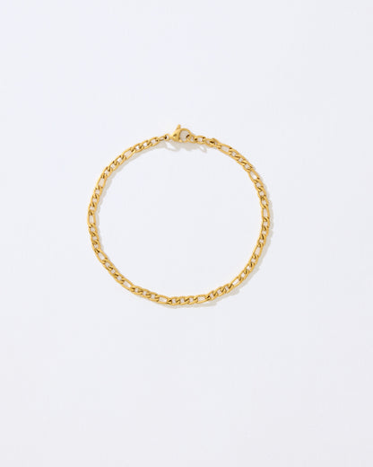 Gold chain bracelet on a white background