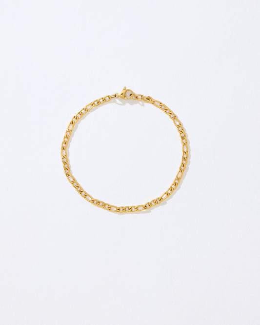 Gold chain bracelet on a white background